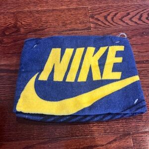 Nike Bold Yellow Logo Towel on Blue